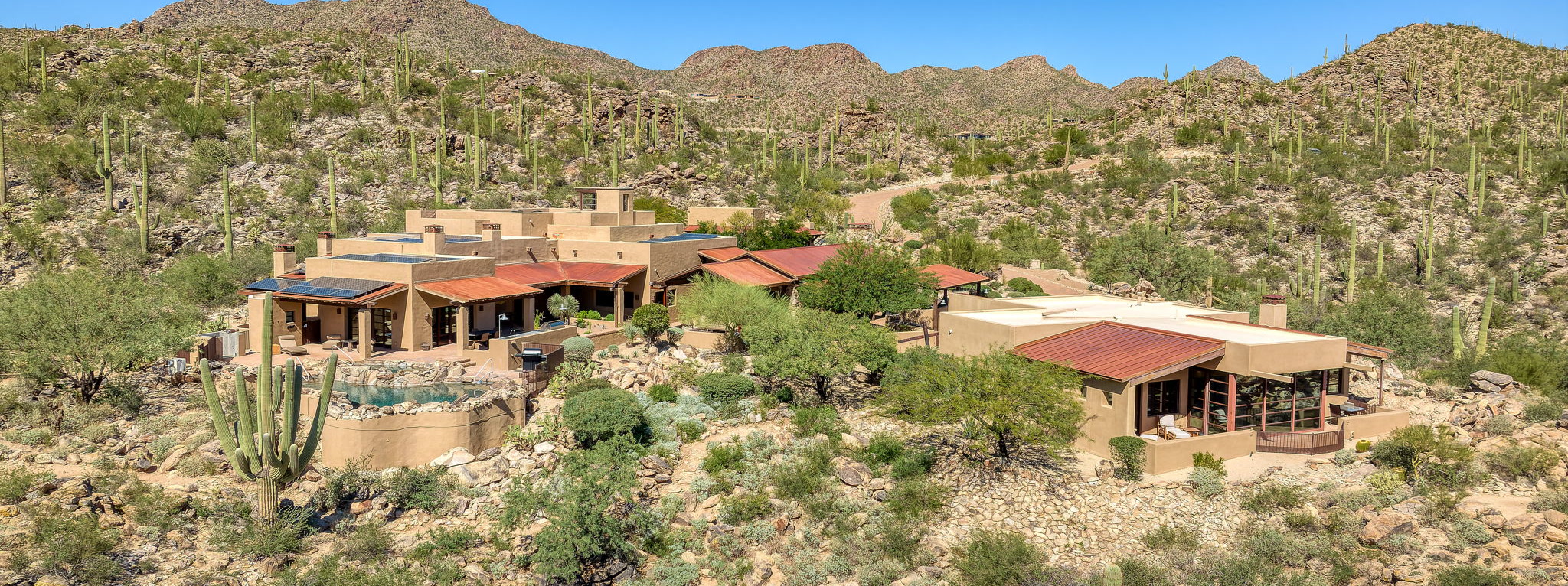 Aerial view of the compound showing the separate structures across the property