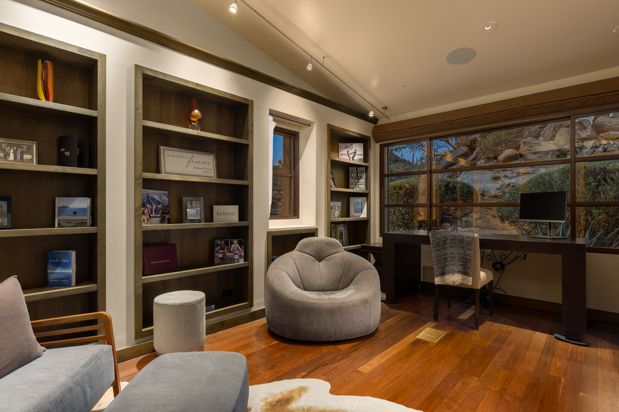 The library, with built-in shelving and a dedicated desk