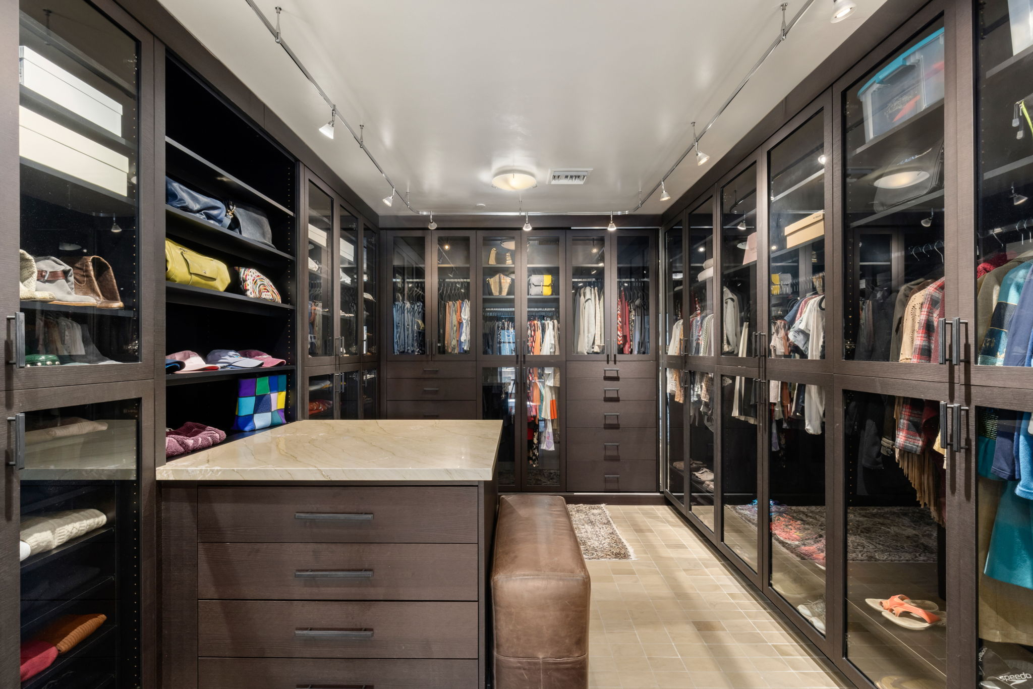 Two dressing rooms with floor-to-ceiling cabinetry