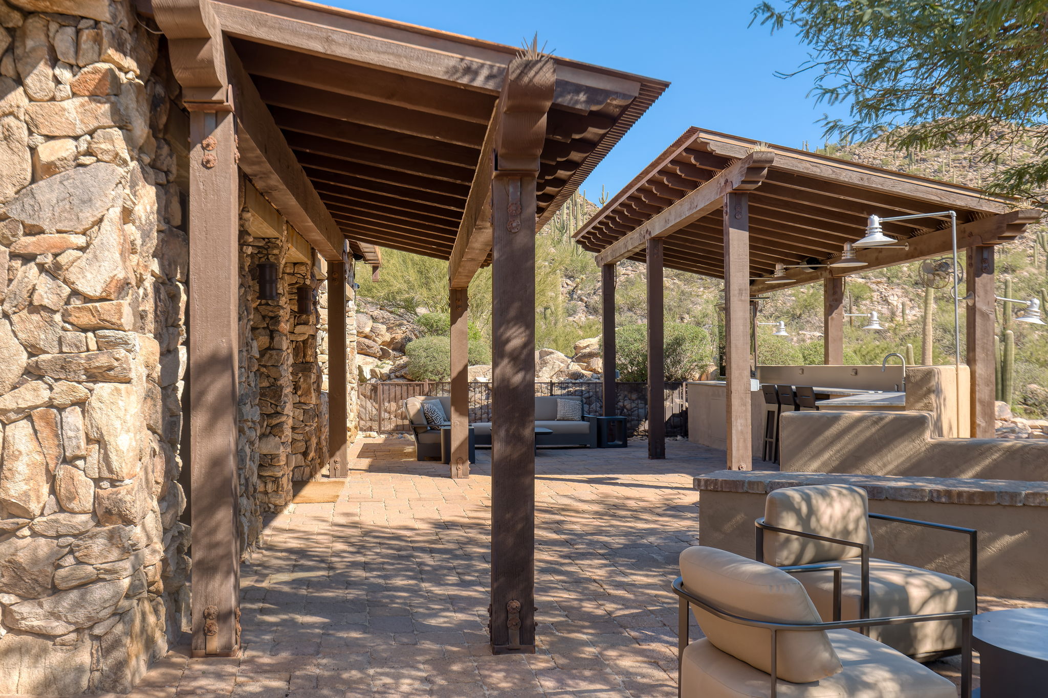 Covered porch with stone pillars