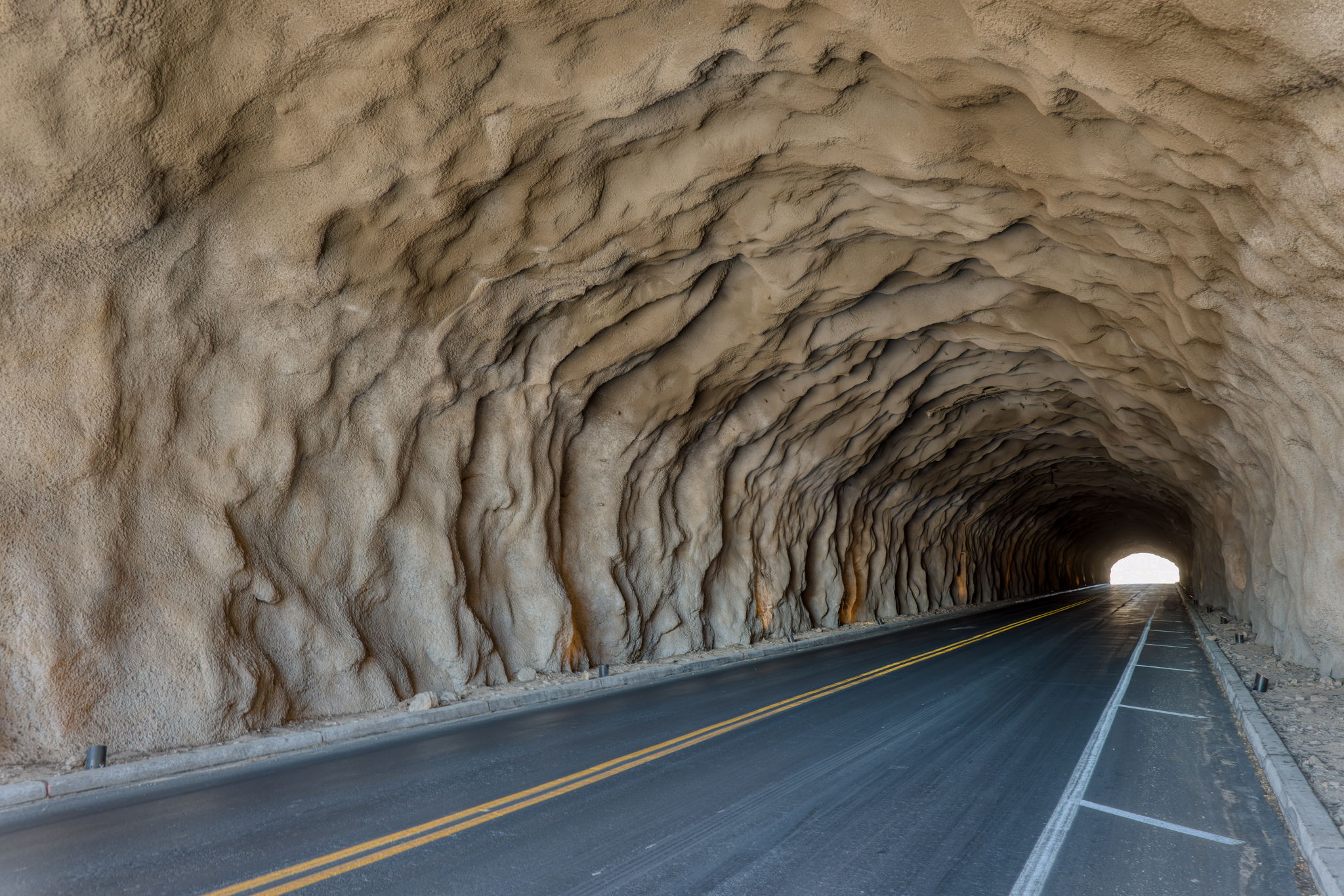 Inside the rock tunnel, looking toward the light